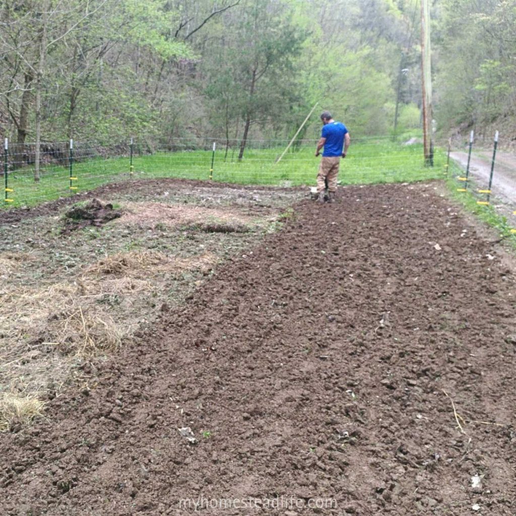 tilling the new garden bed